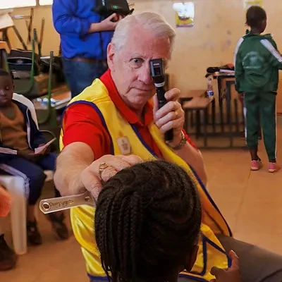 Dr. Edward V. Cordes assesses the videos of a child